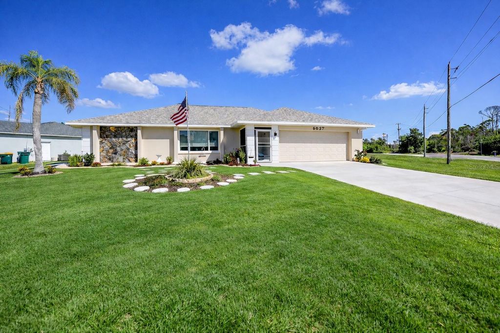 Photo of 6037 David Boulevard, Port Charlotte, FL 33981 (MLS # D6146496)