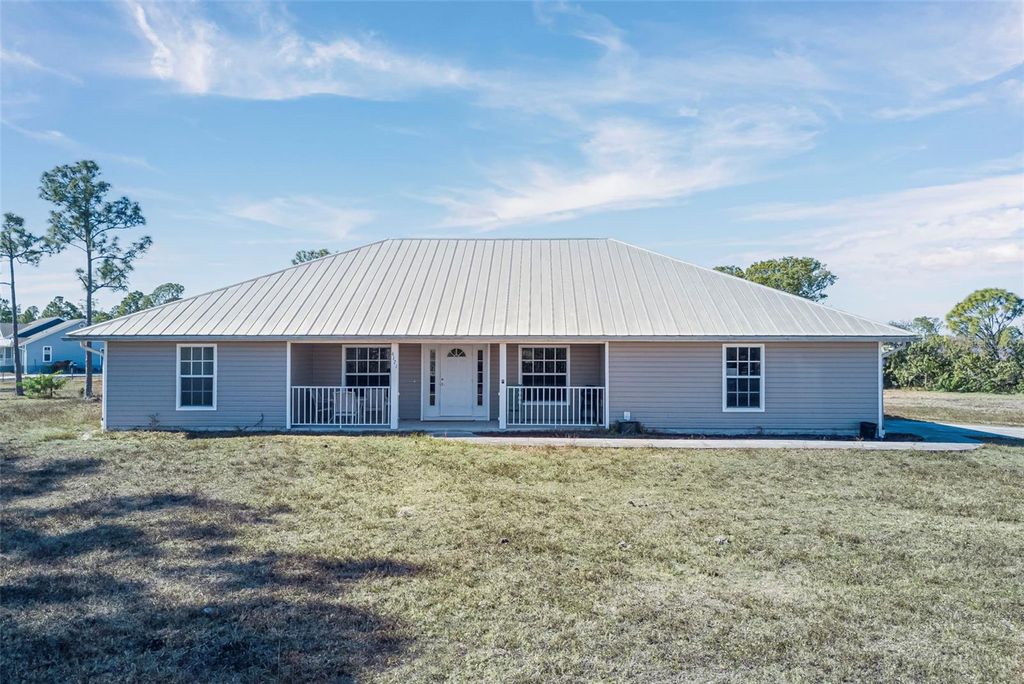 Photo of 6171 Swiss Boulevard, Punta Gorda, FL 33982 (MLS # C7525727)