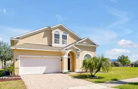 Photo of 559 Cadiz Loop, Davenport, FL 33837 (MLS # O6432513)