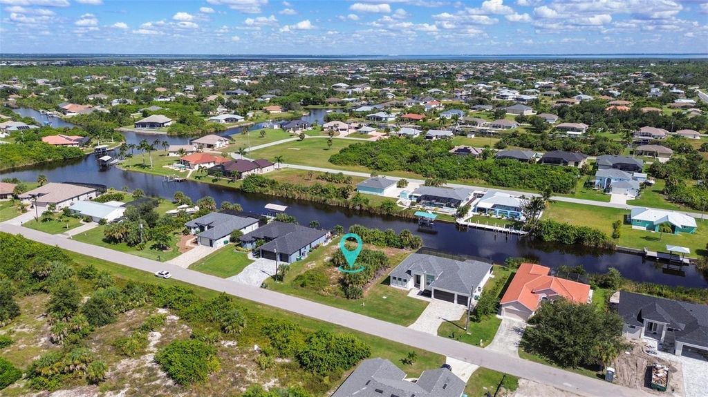 Photo of 9428 Miami Circle, Port Charlotte, FL 33981 (MLS # C7516431)
