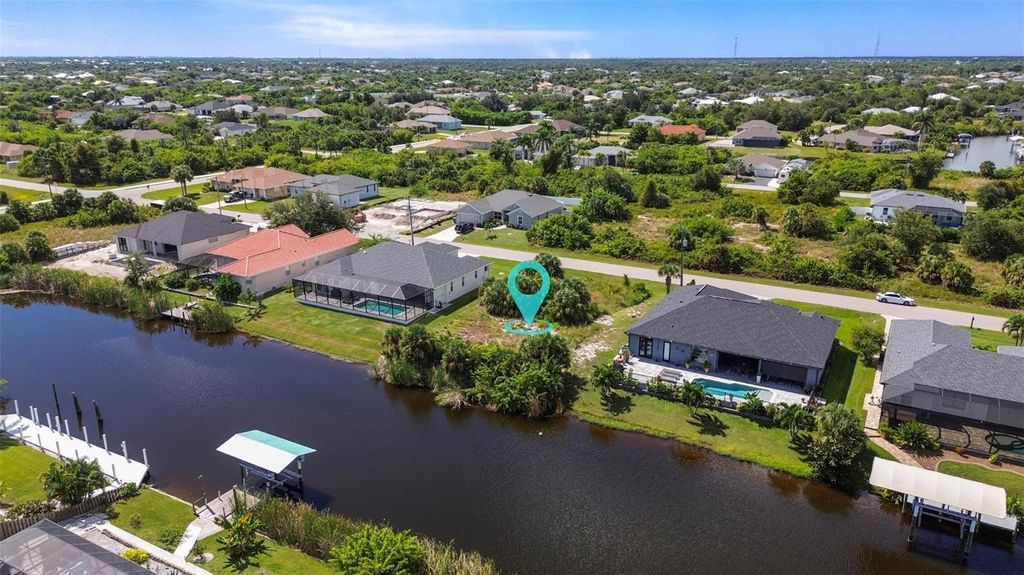 Photo of 9428 Miami Circle, Port Charlotte, FL 33981 (MLS # C7516431)
