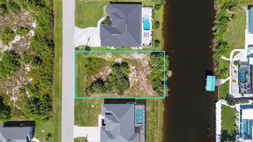 Photo of 9428 Miami Circle, Port Charlotte, FL 33981 (MLS # C7516431)