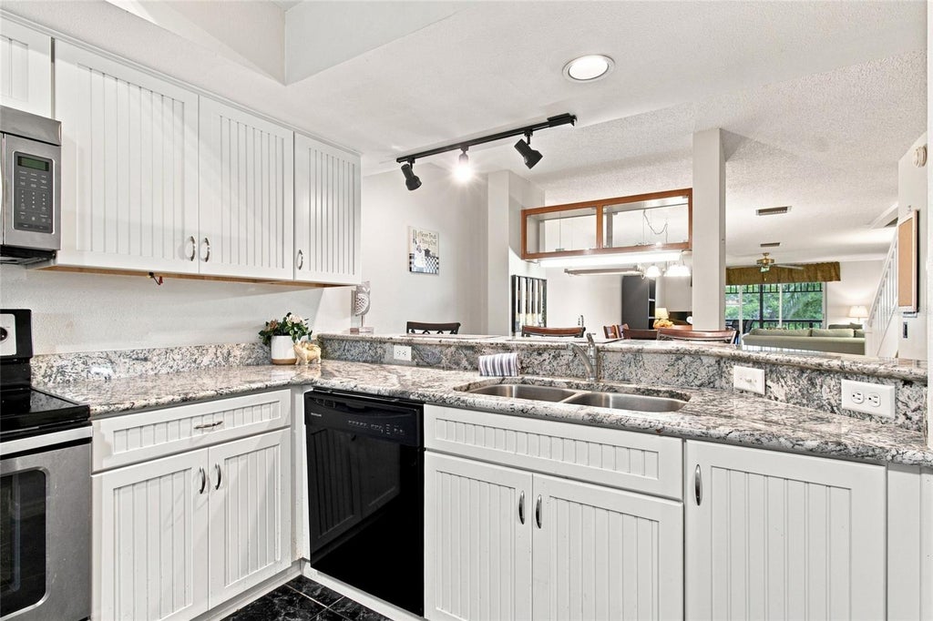 Photo of 2599 Dolly Bay Drive #306, Palm Harbor, FL 34684 (MLS # TB8535290)