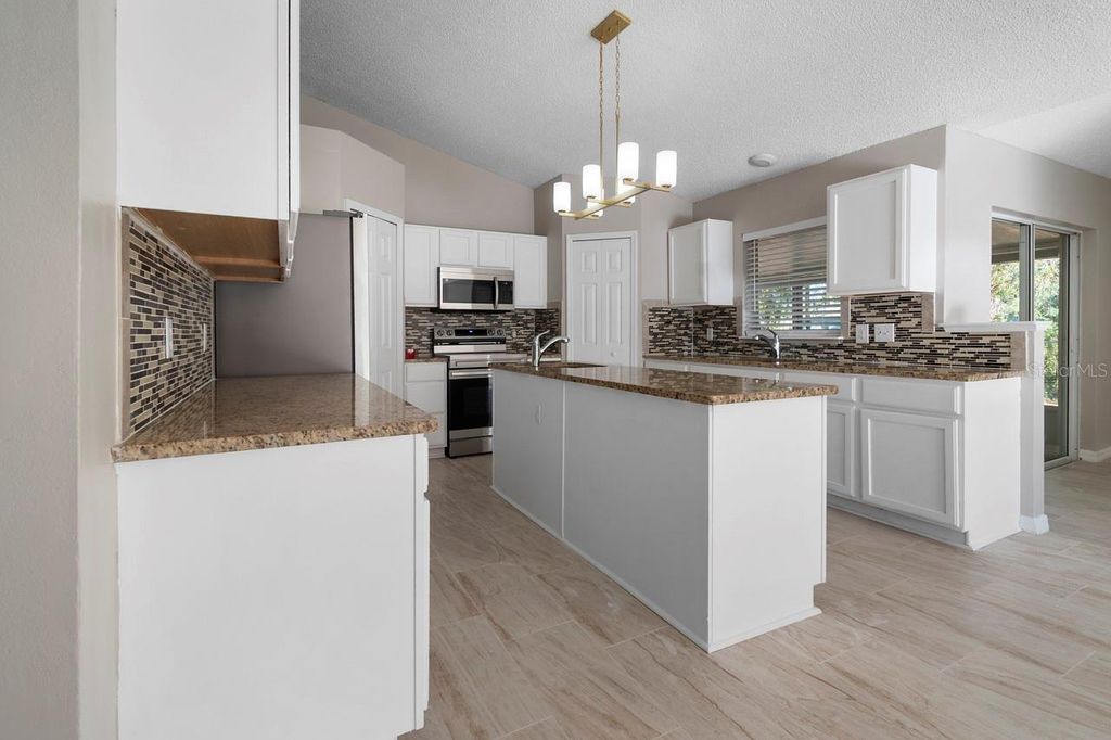 Photo of 1699 Walker Street SE, Palm Bay, FL 32909 (MLS # O6370196)