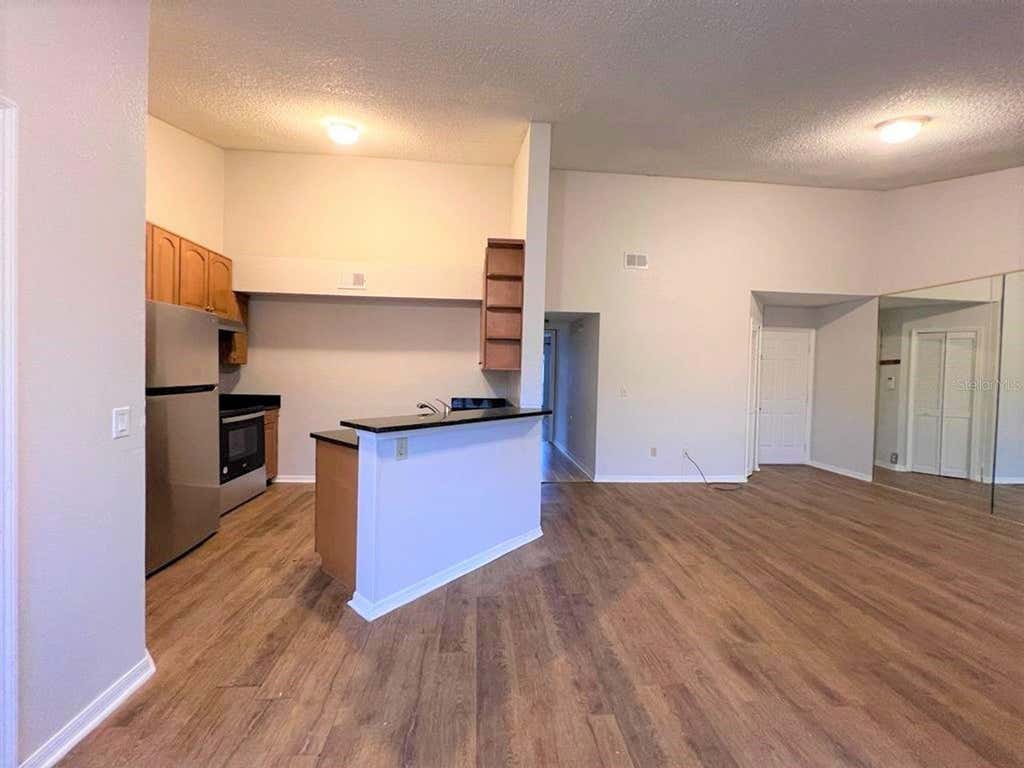 Photo of 4803 Normandy Place #201, Orlando, FL 32811 (MLS # O6429485)