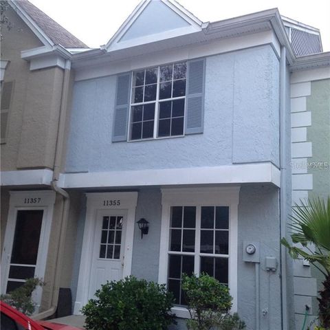 Photo of 11355 Regal Square Drive, Tampa, FL 33617 (MLS # TB8512183)