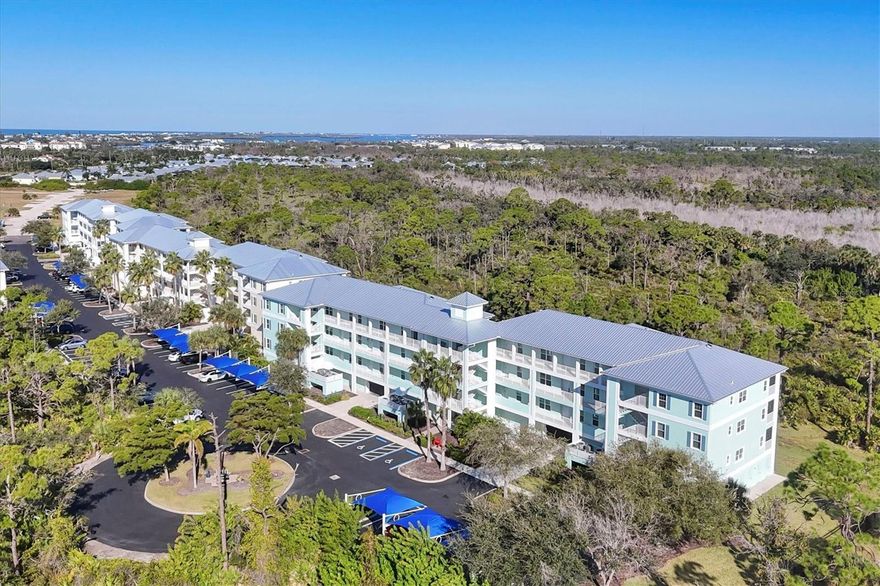 Stunning and spacious 2-bedroom, 2-bath third-floor condo in one of the most desirable and secluded buildings within the gated community of Cape Haze Resort. This residence overlooks the pristine 180-acre Amberjack Nature Park, offering serene views of a native canopy filled with tall oaks, pines, palmettos, and miles of peaceful walking trails. Impeccably maintained, the condo features new carpeting, a newer A/C system, and recent appliances (2019 & 2023). The bright, open floor plan includes an expansive living and dining area, light-filled kitchen, and a comfortably sized screened lanai. Tile flooring extends throughout the main living areas and lanai, adding both style and durability.  Property comes with most of the elegant furnishings and private storage closet.   A substantial community-wide investment has recently been completed, including new metal roofs (2023), impact windows and sliders (2023), updated railings, fencing, and other significant improvements.  Cape Haze Resort provides a friendly, active lifestyle with an impressive array of amenities: a massive resort-style pool, hot tub, clubhouse, fitness center, pickleball, volleyball and basketball courts, a putting green, multiple grill areas and boat trailer parking.  Ideally located in the tranquil Placida township, the community sits directly across from Don Pedro State Park and is moments from Publix, dining, numerous golf courses, three full-service marinas, and the stunning beaches of Palm Island and Boca Grande.