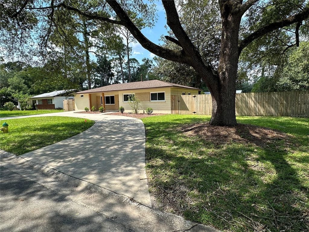 Photo of 1446 NE 22nd Avenue, Gainesville, FL 32609 (MLS # O6402174)