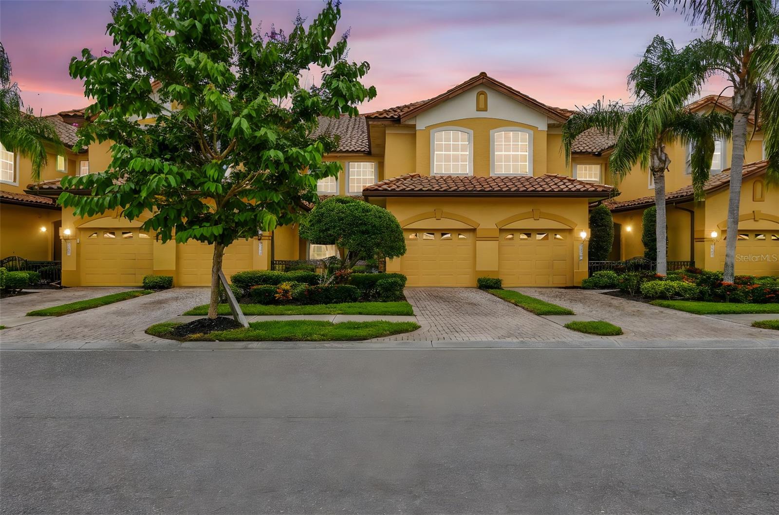 Outstanding opportunity to live, work and play in the #1 selling multi-family community in the country. Miramar Lagoons in the Country Club offers resort like living in a pristine setting located in the heart of Lakewood Ranch. This 3 bedroom 2 full bath 2nd floor home also includes an office/den, screened lanai and 1 car enclosed garage. Starting at the stylish courtyard entry way with mature landscaping and beautiful barrel tile roof you will love the feel of this Gated, Maintenace Free Community. Inside the residence you will find a cozy loft area perfect to sit and relax or read a book. The Kitchen is well appointed with arched entry way, solid surface counters, full size cabinets, mosaic tile backsplash, gas range and eat-in counter space. The dining room is conveniently located adjacent to the kitchen and has lots of natural light. The living room is ample sized and has direct views of the covered screen lanai and mature trees. The primary bedroom is tucked in the back of the home for nice privacy and also has sliding glass door access to the lanai and his/her closets. The primary bathroom features solid surface counters dual sinks, soaking tub and separate shower. The den/office with double entry doors is well located in the center of the home and has in-room access to the 2nd bath with 2 vanities. Bedrooms 2 & 3 are at the front of the home and are well sized with relaxing views. The A/C unit and air handler are less than a yr old and includes a 10 yr warranty and a service contract thru August of 2026. Other improvements include a new garage door May 2025, Nest Thermostat and Nest doorbell. Also included in the low monthly fees is the Miramar Amenity Center which includes beautiful well-appointed clubhouse with fireplace, large meeting room, full sized kitchen, complete fitness center, large resort style heated pool and spa. Plenty of deck space, cabana and covered outdoor kitchen. All of this situated minutes from I-75 interstate access to north and south, many outstanding restaurants, grocery stores, coffee shops,places of worship, recreational opportunities (golf, tennis, pickleball) including Waterside Place at Lakewood Ranch with a farmers' market, splash pool, open spaces overlooking a large lake. The wonderful location is also convenient to University Town Center Mall, Benderson rowing facility, the new Mote Marine Center (coming soon), Sarasota Bradenton international airport, and of course the award winning Gulf Coast Beaches.