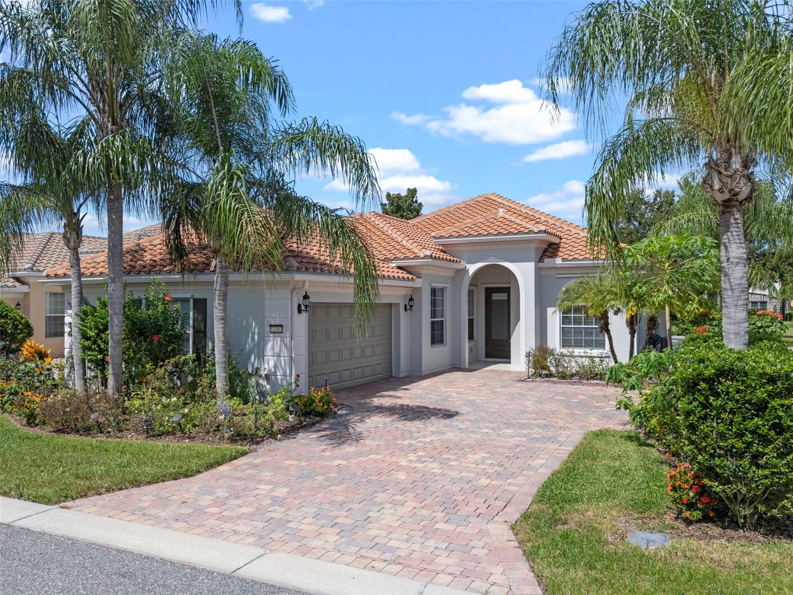 Experience the Ultimate Live-Work-Play Lifestyle in VillageWalk at Lake Nona! Just one mile from Lakenona Medical City, this beautifully upgraded DiVosta-built home sits on a premium corner lot with water views and features a freshly painted interior and exterior. Inside, you’ll find rich wood cabinetry, granite countertops, crown and door moldings, extended screened patio, and custom designer finishes throughout. A flexible den/office (or 4th bedroom) includes luxury vinyl plank flooring and a custom built-in wall unit. The gourmet kitchen boasts granite surfaces, stainless steel appliances, and abundant storage with custom closets. Built for comfort and convenience, this home offers energy-efficient construction, hurricane shutter prep, and 24-hour guard-gated security. VillageWalk Amenities include: Resort-style & lap pools, State-of-the-art fitness center, Tennis & basketball courts, Clubhouse with ballroom, catering kitchen & activity director, Playground & 4+ miles of walking/biking trails, On-site gas station, convenience store, salon & post office, HOA covers complete lawncare, internet, and cable TV for stress-free living. Lake Nona offers top-rated schools, UCF Medical School, VA & Nemours Hospitals, Lake Nona Performance Center, Boxi Park, shopping, dining, and easy access to 417, 528, Orlando International Airport, Brightline, and area attractions. Once you live here, you won’t want to live anywhere else. Schedule your private showing today!