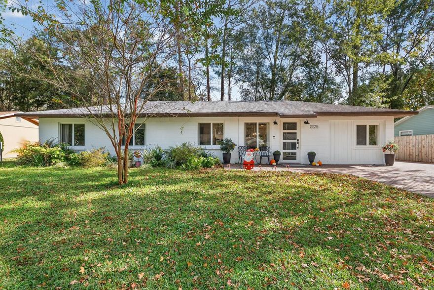 Beautifully Updated Concrete Block Home in Prime Location – Less Than 5 Miles to UF!
This beautifully upgraded concrete block home offers over 1,500 sq. ft. of living space and features 4 bedrooms, 2 bathrooms, a bonus room, a laundry room, a screened porch, and a spacious fenced backyard—all in a highly desirable location.
Step through the new front door into a bright and inviting living/dining area showcasing upgraded vinyl plank flooring (2023), modern fixtures, and abundant natural light. Just off the dining area, the remodeled kitchen features quartz countertops, stainless steel appliances, a stainless steel sink with pull-down sprayer, and a bonus storage nook.
The primary suite includes a private bathroom, a spacious walk-in closet, and a large double-wide window that fills the room with natural light. Both bathrooms have been tastefully remodeled with new glass doors, vanities, and fixtures.
The expansive backyard is perfect for entertaining and relaxing, featuring a screened porch, paved patio, kids’ playground, and storage shed. The upgraded paver driveway enhances curb appeal and extends along the side of the home, providing ample parking.
Additional upgrades include: Hurricane Impact Windows (2023), Exterior Paint (2024), Newer Fixtures Throughout (2023–2025), Cordless Zebra Blinds & Roller Shades (2025), New Sprinkler System (2025), 2 Storage Sheds and a French Drainage System in the Backyard
Located in a no-HOA neighborhood, this home is conveniently situated less than 1.5 miles from Publix and Aldi, within 4 miles of Millhopper Plaza, and under 5 miles to the University of Florida, and is on a direct bus route to UF.