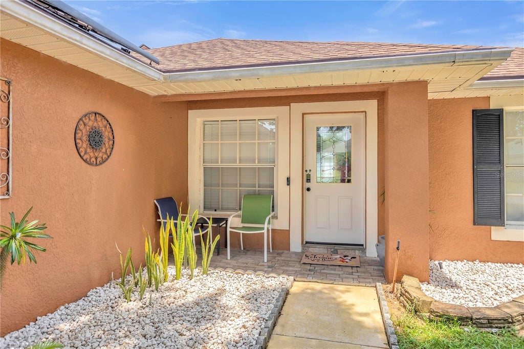 Photo of 154 Walpole Loop, Davenport, FL 33897 (MLS # L4965538)