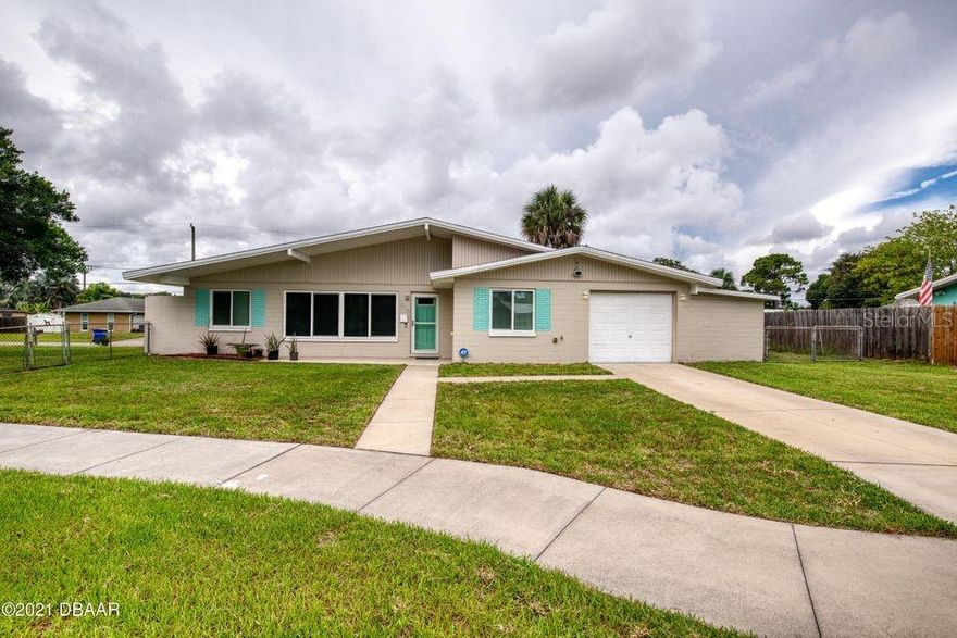 Concrete block home situated on a large fully fenced in double corner lot, boat/RV parking and no HOA! This home opens up to a very spacious living area with a ton of natural light that flows in through the 2019 wind rated vinyl windows. Roof was replaced in 2016 and hot water heater 2019. The home features a split floor plan with 2 bedrooms with large closet space, 2 full-bathrooms that are accessible from each room and a BONUS room with so many options to create an amazing space just for you! The home has a been renovated with durable, waterproof vinyl flooring and pine baseboards throughout the living areas, new ceiling fans with overhead lighting, newer appliances, updated electrical and the main bathroom was completely remodeled to feature beautiful tile floors, marble tile in the shower as well as a marble vanity. The kitchen is equipped with ample cabinet & pantry space as well as a new backsplash. The brand-new low maintenance composite deck in the backyard is a comfortable place to unwind and grill out while enjoying the beautiful weather. The garage has an attached storage room that includes shelves, a pegboard, and a workbench which is great for accomplishing any project. It is centrally located near schools, local parks, and it is just a short drive to the beach, it is a must see, schedule a private showing today!

Room sizes are approximate; all information obtained from tax rolls; all information intended to be accurate but cannot be guaranteed. ;Water: City