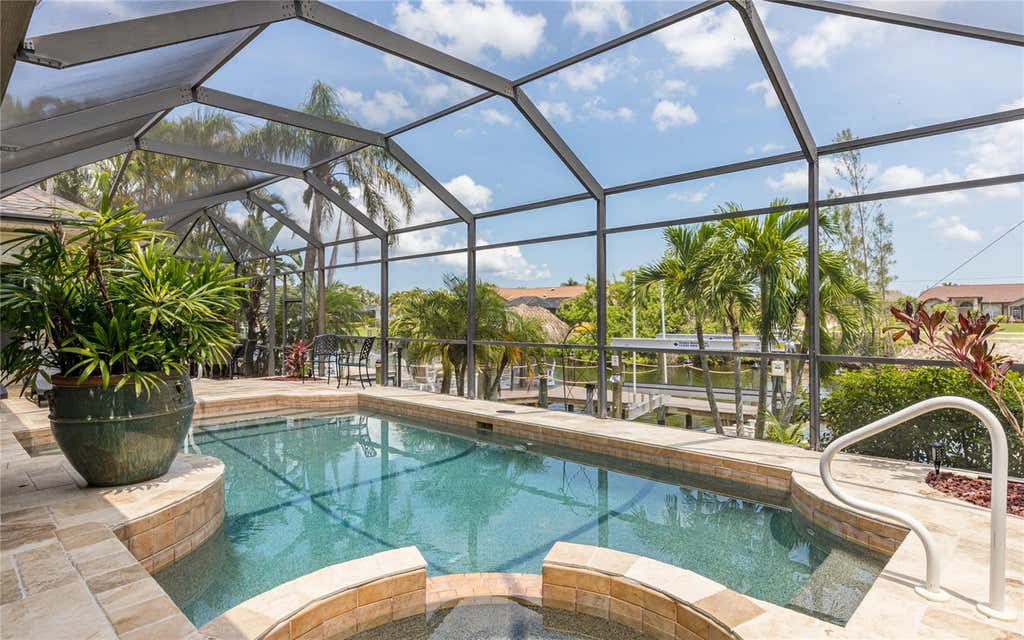 Photo of 2317 SW 43rd Lane, Cape Coral, FL 33914 (MLS # TB8543148)