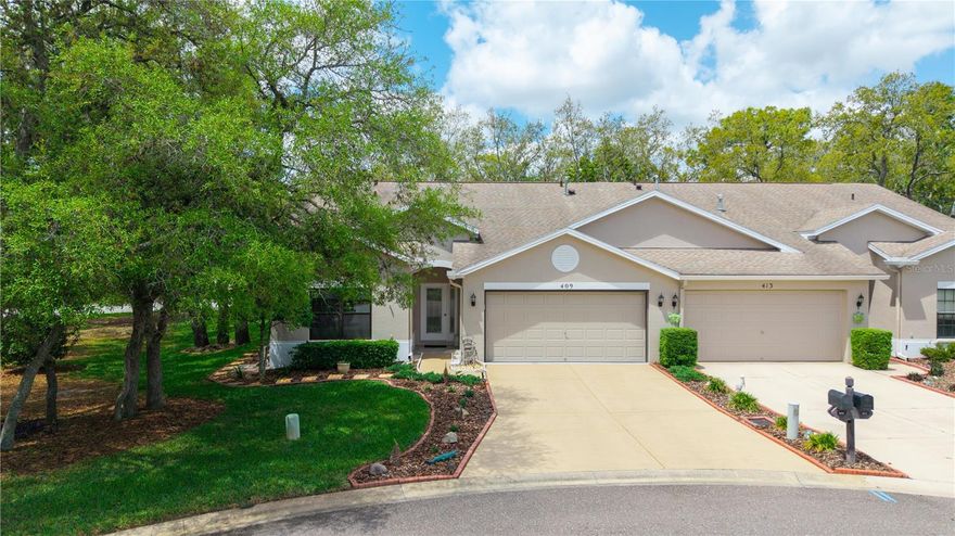 Elegant Villa in Premier 55+ Community situated on a cul-de-sac.

Welcome to this beautifully maintained and thoughtfully updated 2-bedroom, 2-bath villa w/additional flex space for use as an office or extra bedroom located in one of the area’s most desirable communities. Offering approximately 1,574 square feet of comfortable living space, this home combines elegance, functionality, and low-maintenance living.

Step inside to soaring vaulted ceilings and an open, airy floor plan enhanced by premium waterproof laminate flooring throughout the main living areas and bedrooms. The spacious kitchen features all-wood cabinetry, while the expansive living room offers plenty of space to relax or entertain.

The oversized primary suite includes an updated walk-in closet with added storage, creating a private and comfortable retreat. Additional upgrades include impact-resistant thermal pane windows, newer ceiling fans throughout, updated lighting, and a newer A/C system.

Enjoy year-round Florida living from the large enclosed and screened rear patio, perfect for morning coffee or evening gatherings. The home also features beautiful stained-glass entry doors, enhanced landscaping, a large garage, and additional outdoor patio space.

Ideally situated just steps from the clubhouse with abundant guest parking nearby, residents enjoy an amenity-rich lifestyle with HOA services that include cable TV, internet, lawn care, exterior maintenance, roof replacement, clubhouse access, and more.

Conveniently located near shopping, dining, golf, and medical facilities, this move-in-ready home offers the perfect blend of luxury, comfort, and peace of mind.