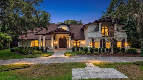 Photo of 1850 Oak Creek Drive, Dunedin, FL 34698 (MLS # TB8526218)