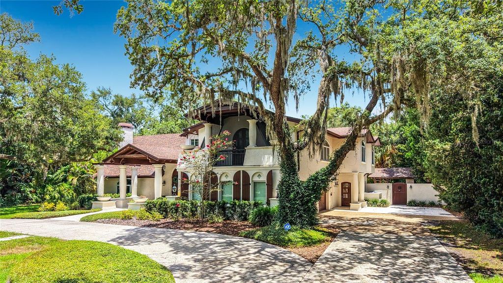 Photo of 1850 Oak Creek Drive, Dunedin, FL 34698 (MLS # TB8526218)