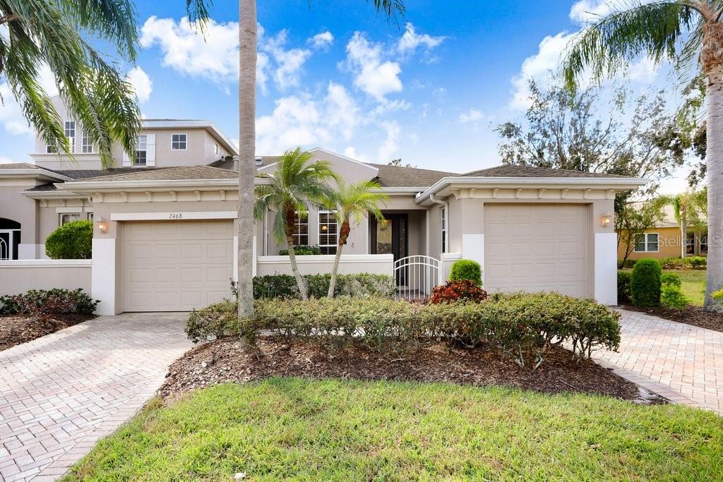 Motivated!! Maintenance Free Living at it's FINEST! Kings Point is a 55+ GOLF CART friendly, GATED/GUARD community with too many amenities to list! Situated on a dead end street, you are going to LOVE the quaint front porch and double driveway garages that will accommodate two cars or your golf cart or even extra storage. Entering in the front door you're greeted with high ceilings and tall doorways. PLUS NEW ROOF 2025 and it has the PLATINUM home care package! The split floor plan is ideal for company or for use as a bedroom or office, complete with a BONUS FLEX space at the front with closet that can be used as the 3rd bedroom (easily add doors), dining room, sitting room, entertaining space...the options are endless. This condo is ideal for your primary home, investment or a second home as it comes MOVE IN READY! This home has been well maintained and is ready for you to move in. Step out on the QUIET screened patio without the noise of the golf course and take note of the beautiful custom design flooring PLUS large brick courtyard for enjoying some sunshine. Home comes complete with a sound system already hooked up to 2 TV’s, Central Vacuum system, generator, water softener and STORM SHUTTERS! More importantly, no flooding or damage from the recent storms. Most windows come complete with custom shutters and others come complete with window treatments. Kings Point has over 200 clubs & activities, multiple indoor/outdoor pools, fitness, pickle ball, and so much more! Fees include cable, internet, exterior insurance, maintenance grounds, private road, security, water, trash, sewer & more! Location is close to restaurants, beaches, shopping and more! You will feel like you are on vacation in your own home! Kings Point and Sun City Center allow access to doctors, its own hospital, shopping, banking, restaurants, and virtually everything you'll ever need via golf cart. It even has its own transportation system, ambulatory and paramedic service. If you plan on venturing out there is quick access to restaurants, SHOPPING, beaches and 30 minutes to Tampa International Airport and the Cruise Ports, less than an hour to the Sarasota shops and 20 minutes to Ellenton Prime Outlets!