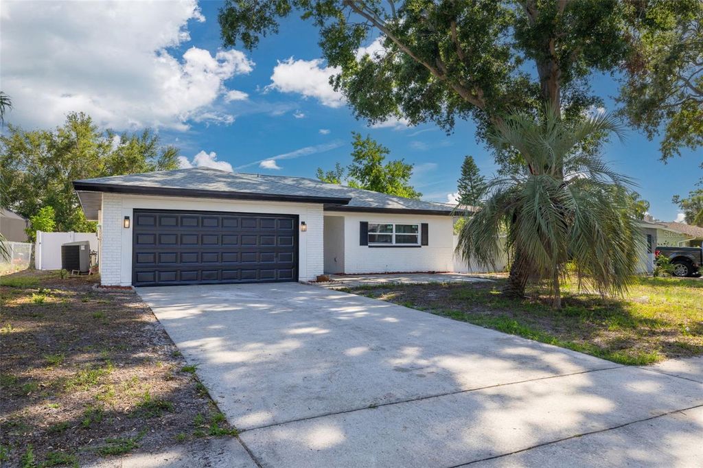 Photo of 2436 Beacon Groves Boulevard, Palm Harbor, FL 34683 (MLS # TB8465304)