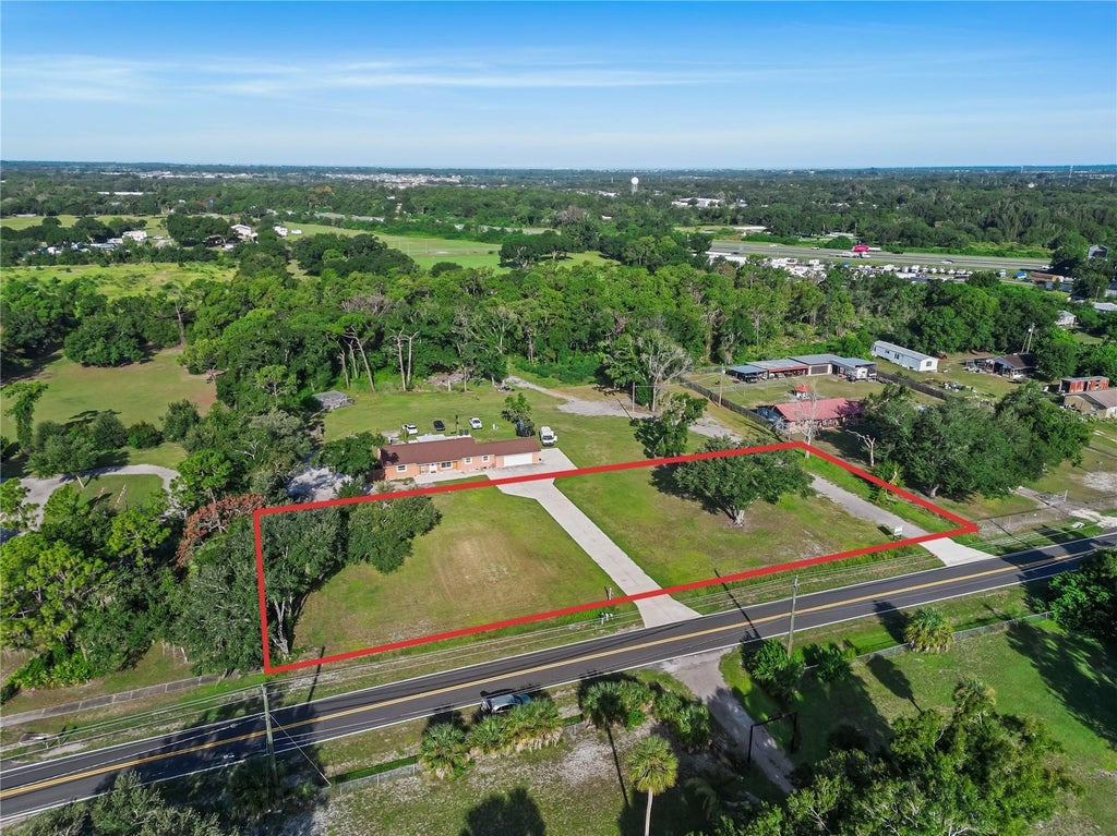 Photo of 1 SE 33rd Street, Ruskin, FL 33570 (MLS # TB8546260)