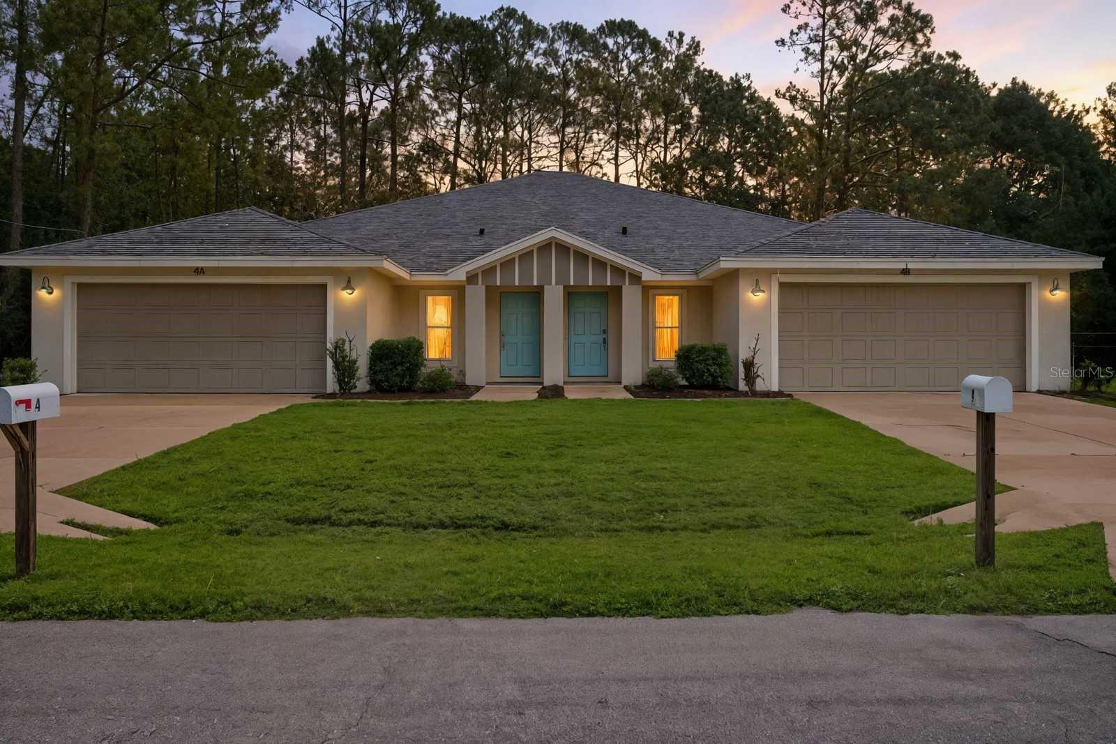 Live in one, rent the other, or bring the whole family! This 2021-built Palm Coast duplex has 3 bedrooms and 2 baths on each side, and each unit comes with its own 2-car garage and a backyard separated by a privacy divider! The open floor plan connects the kitchen, dining, and living areas, and the primary suite sits off the living room with an ensuite bath, walk-in closet, and a vanity or desk area. The other bedrooms are behind the kitchen for extra privacy. LVP and tile flooring, indoor laundry, and ceiling fans keep things low-maintenance and energy-efficient. Right off US-1, you’re just minutes from Ormond Beach, I-95, shopping, dining, and about 15 minutes from the beach! Perfect for multi-generational living, house hacking, or rental income. Come see it for yourself and imagine the possibilities — your next chapter starts here!