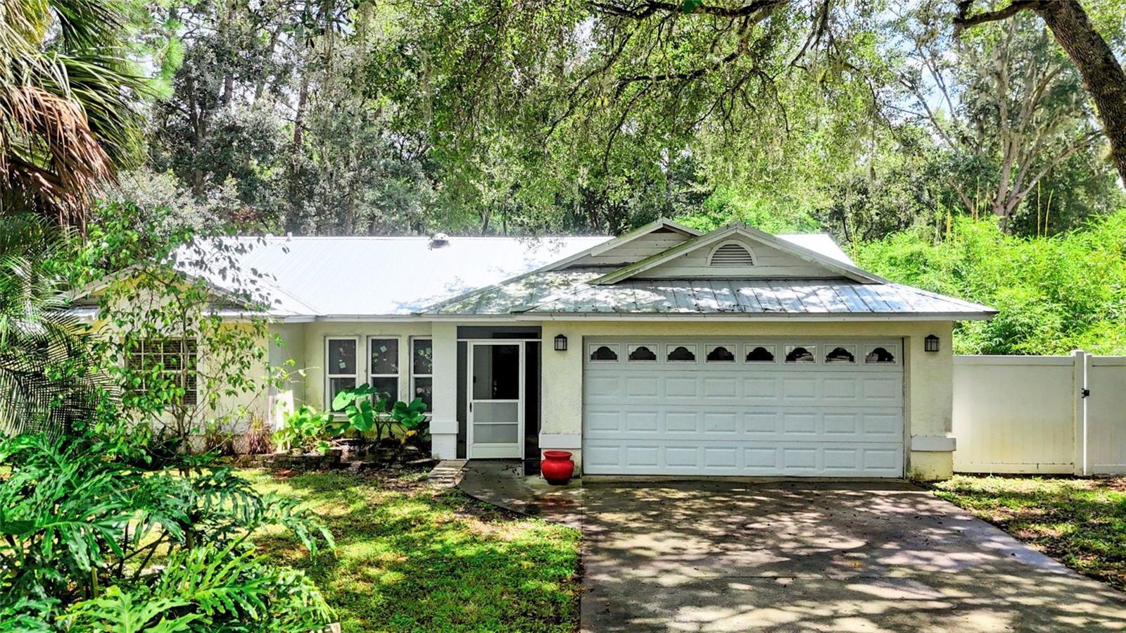 Tucked away in the peaceful Lake Padgett Pine neighborhood of Land O’ Lakes, this beautifully maintained 3-bedroom, 2-bath home offers both comfort and privacy on a generous conservation lot. A spacious bonus room provides flexibility for an office, playroom, or additional living space, while the attached two-car garage ensures convenience and storage.
Inside, the heart of the home is a newly renovated kitchen featuring stone countertops, custom cabinetry, stainless steel appliances, and a peninsula with counter seating—perfect for casual meals or entertaining. Just off the kitchen you will find a spacious living room with tall ceilings and a dining room.
The primary bedroom is generously sized and features a beautiful bay window that fills the room with natural light. The attached en-suite bathroom includes a double sink vanity, offering ample space for daily routines. Throughout the home, wood and tile floors provide low-maintenance living and timeless style.
Step outside to find a spacious backyard bordered by lush trees and serene conservation views, creating a quiet and private retreat. Whether you're enjoying morning coffee on the patio or letting pets roam the yard, this outdoor space feels like your own slice of nature. And yes, this home is pet-friendly too!
Conveniently located near major highways, shopping, and dining, this property combines peaceful living with everyday accessibility.
$35 application fee, $100 admin fee due after application approval, security deposit equal to 1 month's rent, pet fees apply, renter's insurance required. Call, text, or email for more information or to schedule your showing!