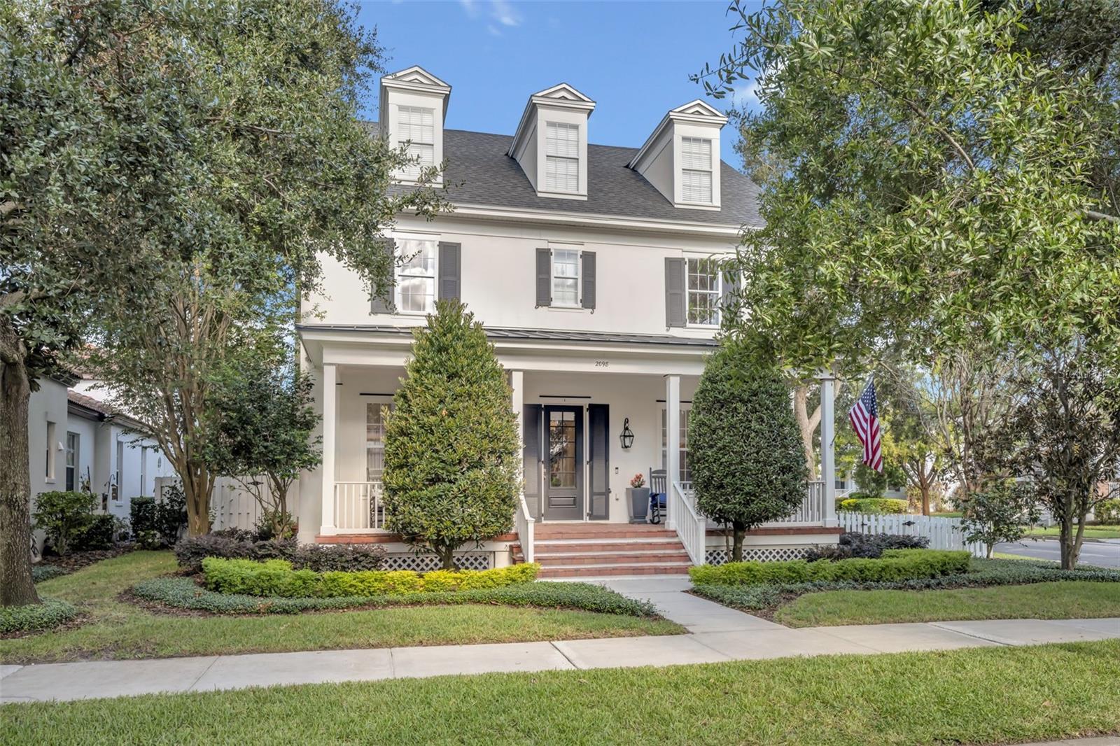 Come see this stunning 5-bedroom, 4.5-bath, 3,811 sq ft home with a luxurious garage apartment, ideally situated on a prime corner lot in the heart of Baldwin Park. Inspired by the iconic style of Jonathan Adler, this home blends timeless sophistication with bold designer flair. Elegant details abound, including custom moldings, 8-inch wide French oak flooring, wainscoting in the office and dining room, and striking fixtures throughout.
The light-filled great room features custom wall paneling, offering a refined yet welcoming space for relaxing or entertaining. The fully remodeled kitchen is a chef’s dream, boasting premium Bosch stainless steel appliances, custom marble countertops, and a show-stopping marble waterfall island with ample storage. Just off the kitchen, you’ll find a spacious walk-in pantry, a built-in office nook, and a custom banquette with hidden storage in the cozy eat-in area.
The first-floor primary suite is a tranquil retreat, showcasing a beamed ceiling with tongue-and-groove paneling, crown molding, and French doors that open to a private side porch. The en suite bath feels like a spa, with marble floors and shower walls, a freestanding soaking tub, and a custom quartz-topped vanity.
The second floor features two generously sized bedrooms connected by a shared Jack-and-Jill bathroom, an additional bedroom conveniently located next to a full hall bath, and a spacious, light-filled loft—perfect for use as a playroom, media room, or home office. Upstairs flooring has been recently upgraded with stylish laminate throughout, and all upstairs interior walls have been freshly repainted for a crisp, move-in-ready feel.
Completing this exceptional property is a beautifully appointed garage apartment—ideal as a guest suite, home office, or rental opportunity—adding flexibility and value to an already incredible home.
This is Baldwin Park living at its finest: elegant, functional, and effortlessly stylish.