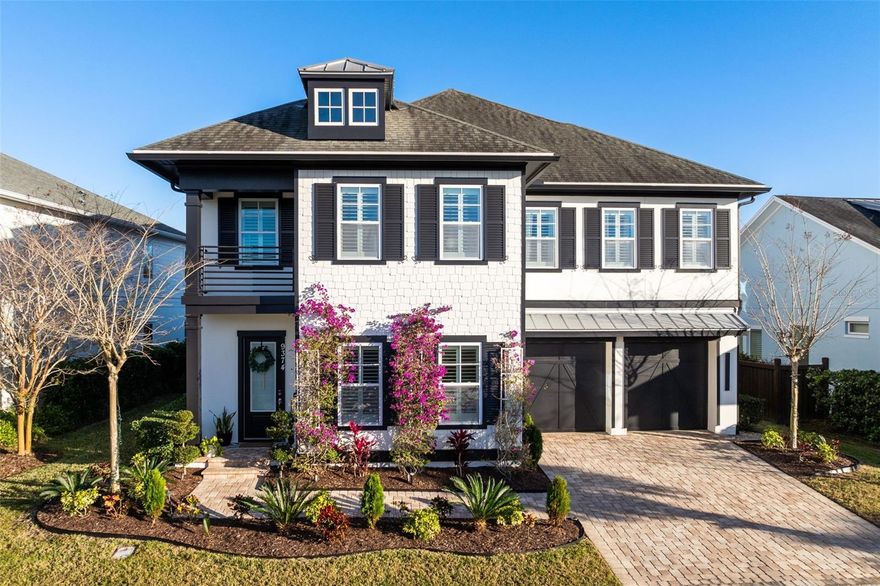 Welcome to 9374 Reymont St. located in Lake Nona’s premier community of Laureate Park.    This unique Ashton Woods model is one of a kind. It features over $500k in CUSTOM UPGRADES such as custom wine room, wood flooring throughout, ceiling-height double cabinets, an extended island, quartz countertops, a double oven, butler’s pantry and valet, hard-wired sensors on all doors and windows, whole house water filtration system, and seamless gutters connected to French drains just to name a few. Upon entering this gorgeous home, you’ll be greeted by voluminous ceilings and oversized windows that allow for an abundance of natural light and a living area with an open railing staircase.    A GUEST SUITE with double French doors is on the first floor complete with its own living/dining area.     An outdoor OASIS awaits to entertain family and friends with a salt water heated pool with custom color lighting, an extended cabana space with additional seating and a chef’s summer kitchen. Outside the pool is a putting green amid meticulously manicured custom landscaping. The home sits on a lot that backs up to a PRESERVE for additional privacy.     Laureate Park HOA includes pools, a fitness center, parks, walking/biking paths, and A-rated schools. Nearby is Lake Nona Medical City, USTA Tennis Center, MCO Airport. restaurants, shopping, and more!