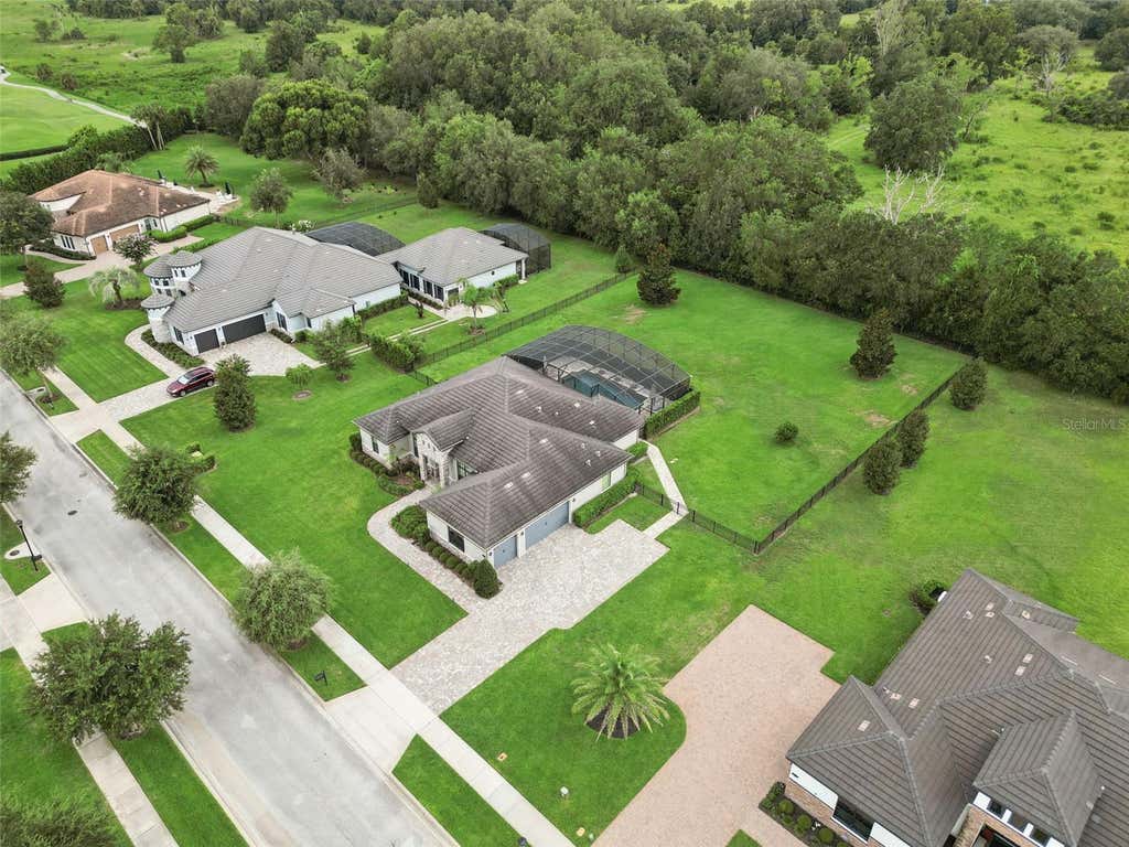 Photo of 25874 Crossings Bluff Ln, Sorrento, FL 32776 (MLS # O6436113)