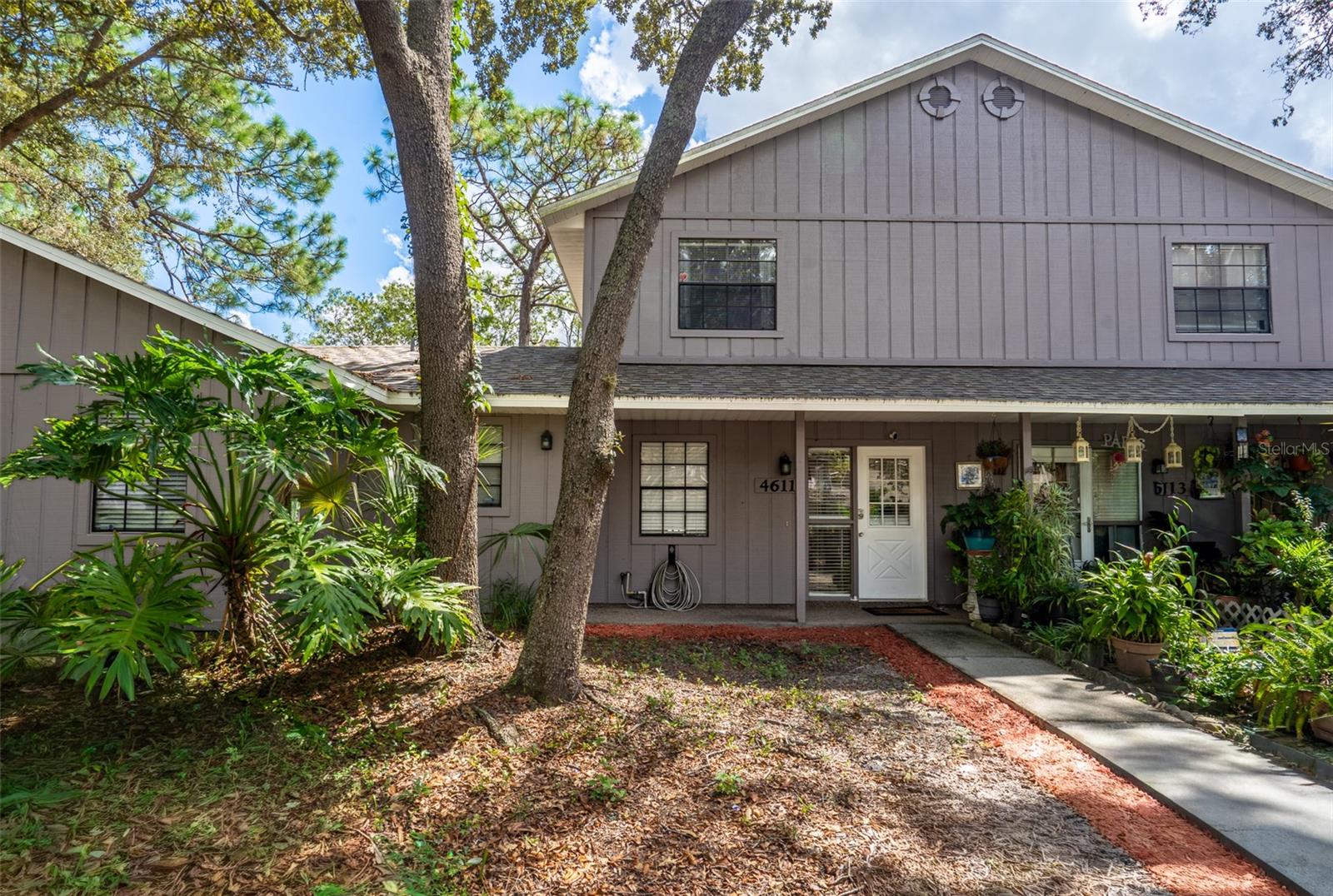 Welcome to this spacious Carmel Oaks condo offering over 1,000 square feet of living space in the heart of Orlando. The open layout downstairs features a large living and dining area with tile flooring, a functional kitchen with Formica countertops, and a convenient half bath for guests. Upstairs, both bedrooms each include their own en-suite bathrooms, upgraded with granite countertops, and offer plenty of closet space. The bedrooms feature wood floors, while the stairs and landing are carpeted for comfort. Recent updates include the AC system replaced in 2016, providing peace of mind. A covered entryway adds to the appeal, and the community’s central location places you just 20 minutes from downtown Orlando, with easy access to major highways, shopping, and dining. You’ll also enjoy being near the Rosemont Community Center, which offers a pool, playground, gym, and more. This home combines affordability, comfort, and convenience—schedule your showing today!