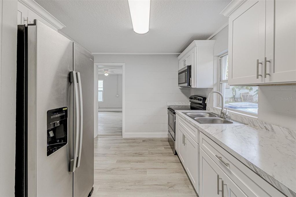 Photo of 9 1st Street SE, Fort Meade, FL 33841 (MLS # L4957831)