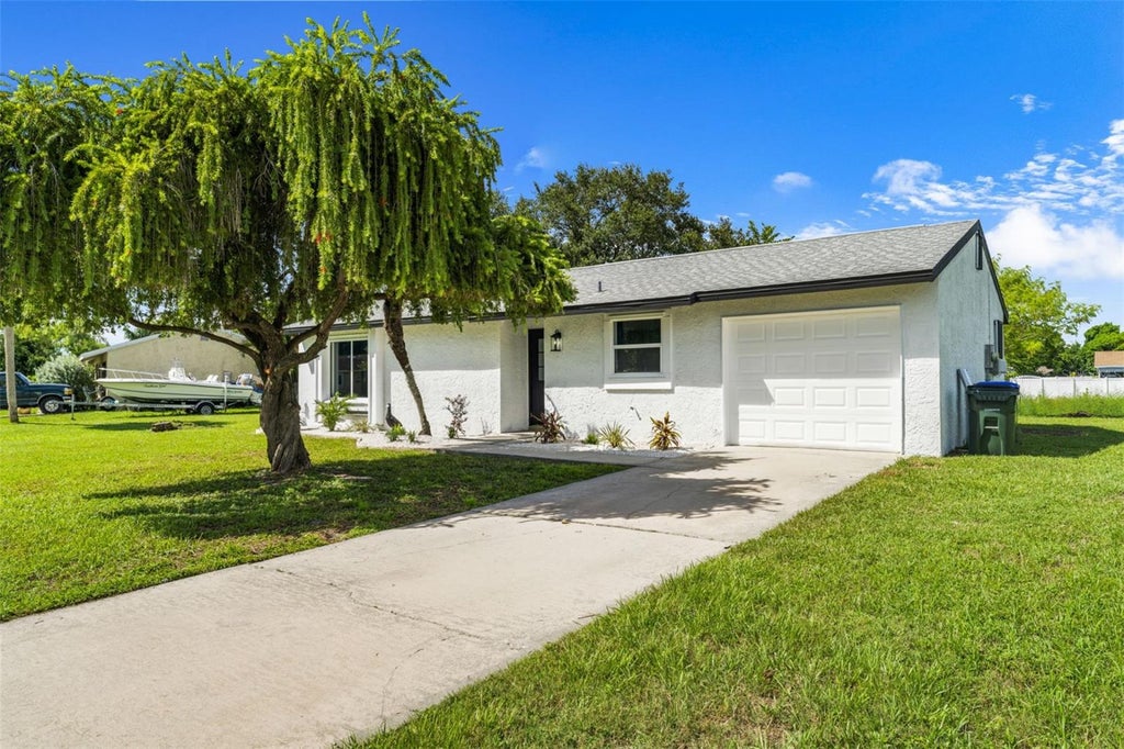 Photo of 6820 Harmony Road, North Port, FL 34287 (MLS # TB8547482)
