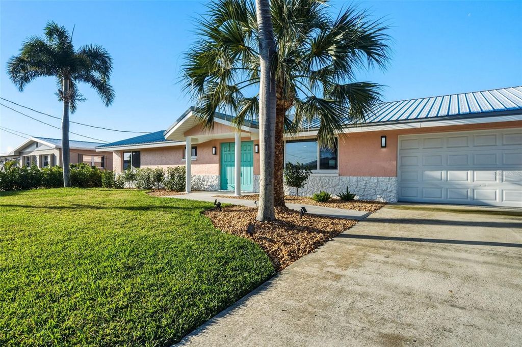 Photo of 105 Leland Street SE, Port Charlotte, FL 33952 (MLS # C7523012)