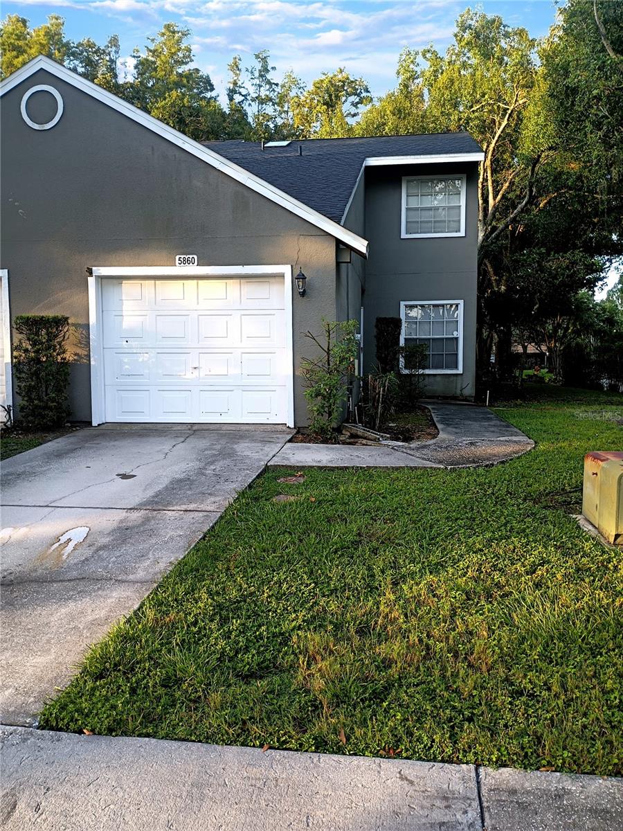 Beautiful "turnkey" 2 bedroom, 2.5 bath Townhome with attached garage !!!! Prime location in Carrollwood/Citrus Park close to everything in Tampa. Easy access to Vets Expressway, Mall, Airport, Beaches and Orlando. Built in 1985 but updated style like new construction. New roof and skylight installed Nov 2024. Upgrades include renovated half bath downstairs, kitchen, 2nd bathroom and water heater. Corner unit with additional parking across, step inside to living room/dining room combo with laminate flooring, screen patio overlooking conservation area, skylight over staircase, Upstairs you have split bedrooms with full renovated bath and master bedroom with walk in closet. Your HOA fees covers everything outside of your home, including the roof and community pool. Don't miss your opportunity to have the American Dream.