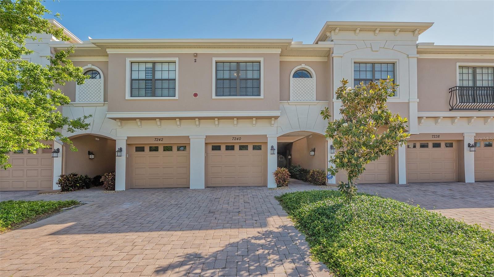 Experience maintenance-free living at its best at Palma Sola Trace! This stunning Carlisle townhouse unit boasts one of the largest floor plans in the community. Upon entering through your beautifully landscaped walkway, you'll find an open-concept dining and living room area adjacent to the kitchen. The garage provides easy access to this lovely unit.
Step into the screened lanai off the living room, where you can relax and enjoy the tranquil stream just outside your door, surrounded by beautiful wildlife—perfect for savoring your morning coffee or evening drink. The galley kitchen features granite countertops, all-wood cabinetry, and stainless-steel appliances, complemented by a spacious pantry for all your culinary needs.
Conveniently, the one-car garage is located near the kitchen, with an additional tandem parking spot available, along with extra guest parking across the street. Upstairs, you’ll discover the primary bedroom and bath, complete with a large walk-in closet and an updated bathroom featuring a single vanity with granite counters. At the end of the hallway, two additional bedrooms share a bathroom with a tub and shower combo, also equipped with granite countertops. These generously sized bedrooms can easily accommodate queen beds and furniture.
Plus, the laundry is conveniently located upstairs—no more hauling loads up and down the stairs! Enjoy a prime location close to shopping, dining, and just minutes from the world-renowned beaches of Anna Maria Island. Palma Sola Trace also offers a community pool, fitness center and is a very pet-friendly community