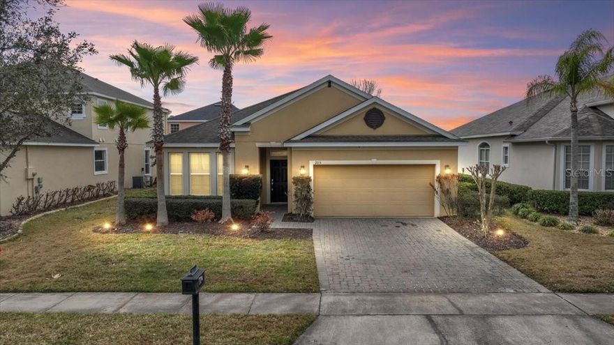 Welcome to a very spacious, well-constructed D.R. Horton Robinson model with plenty of space for the whole family!  This block and stucco home is situated inside the prestigious Masters Glen of LPGA, where you can easily access the golf courses, practice holes, driving range, restaurant and clubhouse with a community pool.  Very close by, you will also find a Publix, restaurants, a Starbucks and shopping galore at Tanger Outlet or Trader Joe's, as well as easy access to the major interstates. This home opens from an impressive foyer into an open great room with numerous windows and a kitchen with a large granite island - offering seating at a breakfast bar, and a kitchen featuring stainless appliances, a place for your coffee station and a large pantry.  The very spacious dining area overlooks the beautiful backyard and screened in porch with a peek of the nearby pond.  There is no carpet in this lovely home, and you will enjoy the ease and simplicity of tile throughout.  The home has a split floor plan with the primary suite in the back of the home, and the other bedrooms at the front, for maximum privacy and convenience.  All of the bedrooms are large and have easy access to a full bathroom, making it simple to have overnight guests.  If the owner enters through the convenient, two car garage, there is a storage nook for shoes, keys, purses, briefcases, etc.  The primary suite boasts a garden tub, a large walk-in shower, a double vanity and a spacious walk-in closet.  This home is much larger than it appears and is ready to be your next primary residence or winter golf retreat in the sun! All information taken from the tax record, and while deemed reliable, cannot be guaranteed.