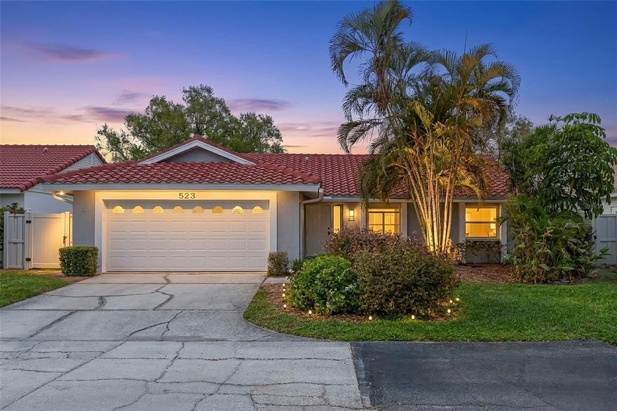 Perfectly positioned on a serene lakefront lot within the guard-gated community of Placido Bayou, this custom-built residence offers a rare blend of privacy, natural beauty, and effortless Florida living. From the moment you step inside, soaring ceilings and tranquil water views immediately draw your eye, creating a bright and welcoming sense of space. The kitchen is thoughtfully tucked away for privacy while remaining connected to the main living areas through an open breakfast bar, ideal for both everyday living and casual entertaining. Abundant storage, natural light, and a charming garden window, perfect for an herb garden, make this space as functional as it is inviting. The spacious living and dining room combination is filled with natural light, enhanced by vaulted ceilings and a skylight overhead. Just beyond, a converted sunroom provides additional living space lined with windows overlooking the lake, creating a peaceful setting to relax or entertain. The sunroom flows seamlessly to a large screened porch, allowing you to enjoy the waterfront setting year-round. The thoughtfully designed three-bedroom, two-bathroom split floor plan balances openness with privacy. The primary suite serves as a true retreat, offering a private bath, generous closet space, and direct access to the screened porch where you can wake each morning to calming lake views. Outside, the charm continues with a spacious yard offering room to relax, explore, and enjoy the peaceful surroundings, including fishing right from the lake. Lovingly maintained and showcasing true pride of ownership, the home is move-in ready while still offering a wonderful opportunity for a new owner to bring their own design vision and personal style. Additional convenient features include an interior laundry room and a two-car garage, providing ample space for both parking and storage. While this home sits on a small lake, it has no history of flooding. Residents of Placido Bayou enjoy a tranquil setting with scenic lakes, abundant Florida wildlife, and winding sidewalks perfect for morning runs or evening strolls. Despite its peaceful atmosphere, the community is just minutes from the vibrant waterfront of St. Petersburg, where renowned dining, boutique shopping, world-class arts, and year-round events await. Award-winning beaches and airports are also just a short drive away, and the Racquet Club of St Petersburg is at the entry of the neighborhood, where you can enjoy both pickle ball and tennis! This is the perfect setting to embrace the effortless indoor-outdoor lifestyle that defines Florida living. Welcome home.
