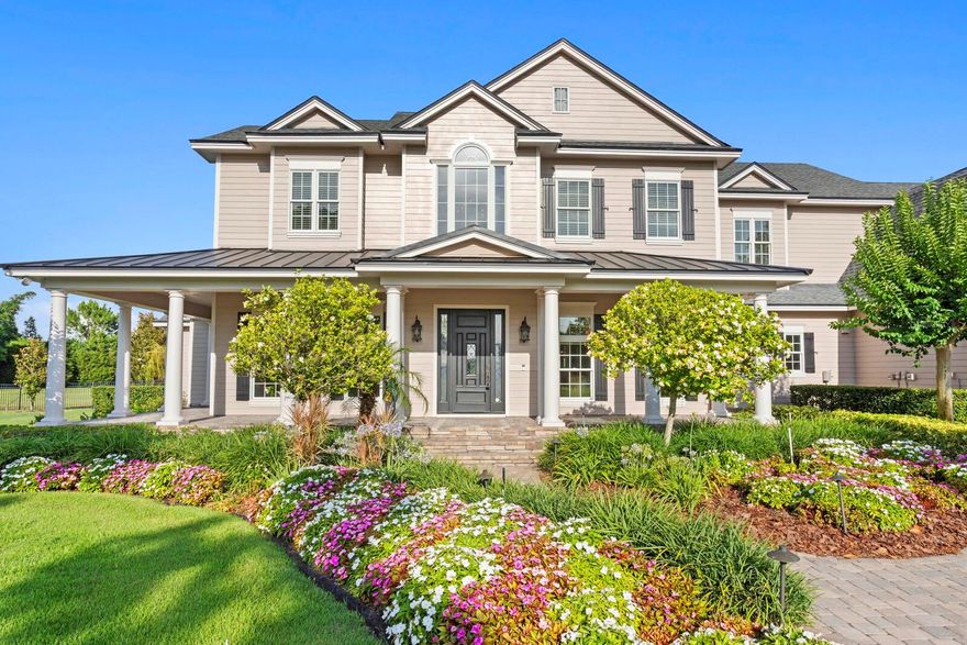 Welcome home to this Custom-Built estate, located in the Gated community of Steeplechase, overlooking and with access to Lake Velburton, on over 3 lusciously landscaped acres. With its 5 Bedrooms and 6 &1/2 baths, Pool, and abundant amenities, you’ll be proud to call this property “home”.  Upon entering the Grand Foyer, you will be greeted by a half-spiral staircase, and a boundless view through the family room, onto the infinity pool and lake. To the right is the Formal Dining, with adjacent Wine-Bar/Butler’s Pantry, perfect for storing accoutrements, with nearby Powder Room. All this is conveniently adjacent to the Kitchen with: Island, Wolf-Range, Range Hood, Sub-Zero Fridge/Freezer with icemaker and cabinet fronts, oversized basin-sink with reverse osmosis faucet, 2-Dishwashers, Microwave, Eat-In Bar, and Walk-In Pantry. All next to a semi-circle breakfast area with an amazing view of the pool and lake. Conveniently located next is the Utility room with W/D hook up, shelving, and access outside. Attached 4-Car Garage has tile flooring and A/C. Second attached garage is adjacent to ODK, with attic storage. Downstairs also provides the designated workspace/Office with Built-in shelving, cabinets, and fireplace. Owner’s Suite with its En-Suite Bath, featuring vanity with double sinks, claw-foot tub, walk-in shower with rain-shower and traditional showerhead, privacy window for light, and two separate walk-in custom closets, plus fireplace, all overlooking the pool and lake, with easy direct access to the outside. The family room provides coffered ceilings, built-in shelving and abundant space to enjoy, plus view and access to outside. The backyard includes a completely screened-in Outdoor Kitchen including built-in grill, fireplace, sink, fridge, cabinets, wall mounted T.V., eat-in bar, and ceiling fan. All adjacent to the ‘beach-entry’, infinity-edge pool and spa area with paver decking, all with the great expanse of the view of the lake and property, which is partially fenced with aluminum fencing. Upstairs, bedrooms, all feature en-suite baths and custom walk-in closets. Bedroom 2 is double-spaced to allow an option for an upstairs owner-suite or special guest. Bedroom 5 could also be a Theatre/Exercise room. Lastly, a generous-sized Game Room with built-in wet bar, microwave and mini-fridge, and pool table. Property also, incudes Control4 system and 27 K/W Generator, which runs on Propane. The Vacant Land adjacent to the listed property/house, can be purchased, but is NOT included in the Listing and has a separate Tax ID. Price TBD