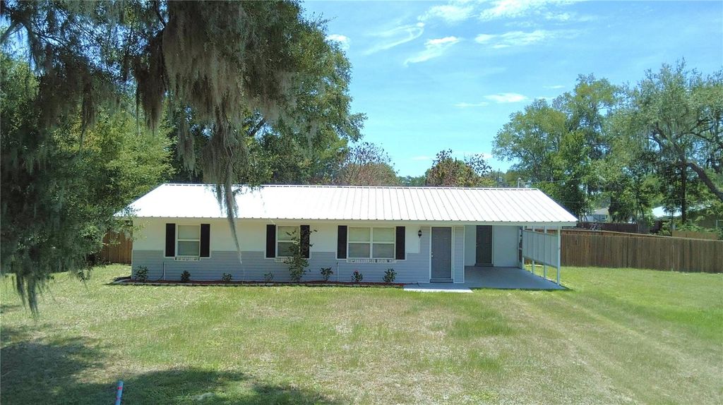Photo of 606 N Nashua Avenue, Fort Meade, FL 33841 (MLS # P4938899)