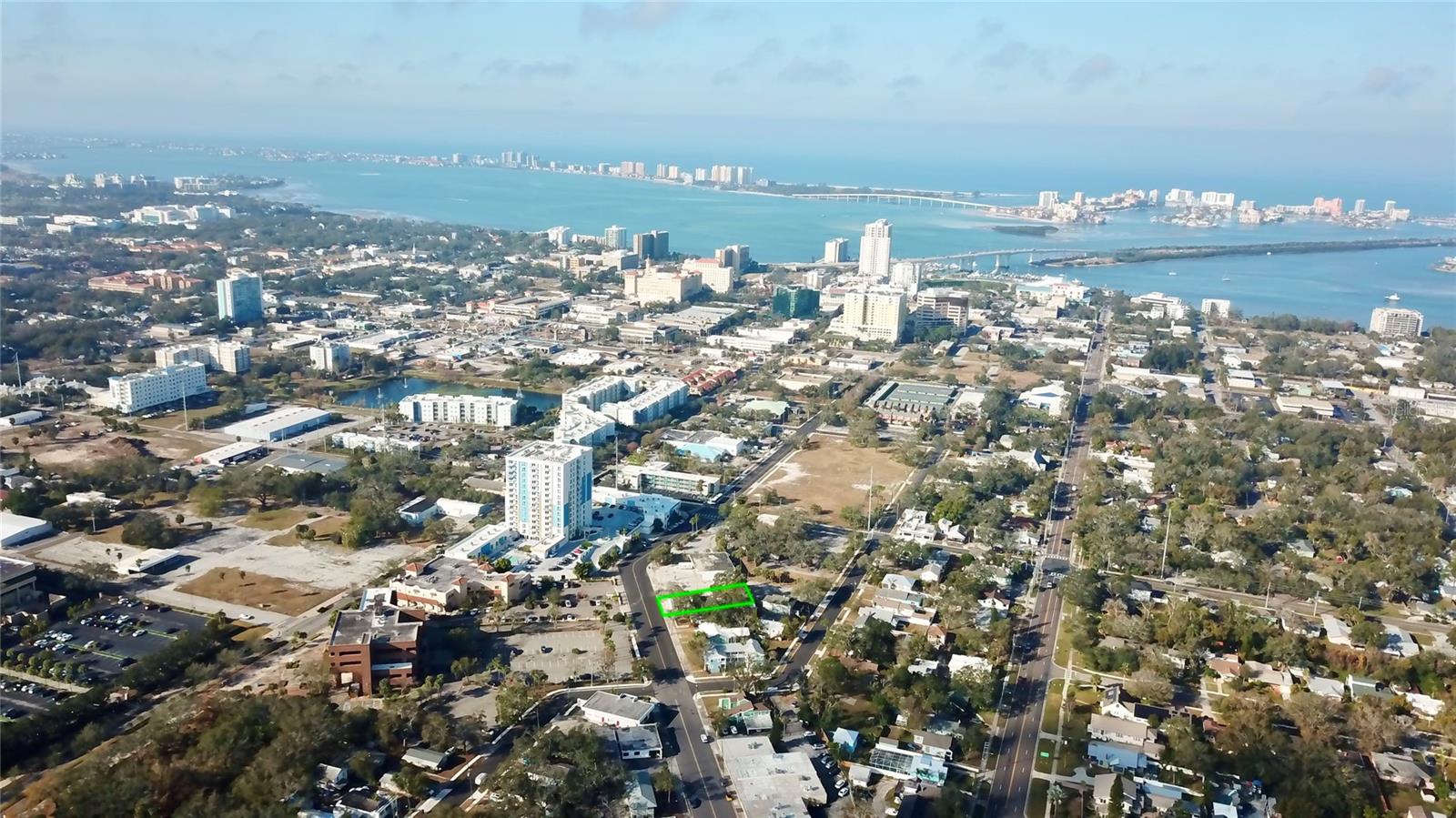 Ready for Redevelopment and could be double the square footage if made into a 2 story... The intent and purpose of the Downtown District and Development Standards is to guide the development and redevelopment of sites in Downtown Clearwater consistent with the vision, guiding principles, goals, objectives and policies in the Clearwater Downtown Redevelopment Plan to achieve quality urban and architectural design throughout Downtown. Intended for high-intensity residential and mixed-use development in buildings with street-facing entries opening onto pedestrian-friendly streetscapes and with active ground floor uses along many streets. Buildings are designed with façades aligned along public sidewalks with parking and service areas primarily located behind buildings. This character district is intended to create a transition between higher intensity mixed-use areas in the Downtown Core Character District and residential areas to the east in the Downtown Gateway Character District.
The following Business types can go here: Hotel, ALF’s, Museum, Bar/Nighclub, Bed&Breakfast, Indoor Rec/Entertainment, Office, TV Radio Station, Veterinary Services, Alcoholic Beverage Sales, Education Facility, and the list goes on.
The Maximum Hotel Density for this area calls for 40 units pr acre and this lot is .13 and the Maximum Height your building can be is 30-35 feet depending on how close your structure is from neighboring property.
The existing building was built in 1925 and is in bad shape so our best idea is to have a new creation built and developed.