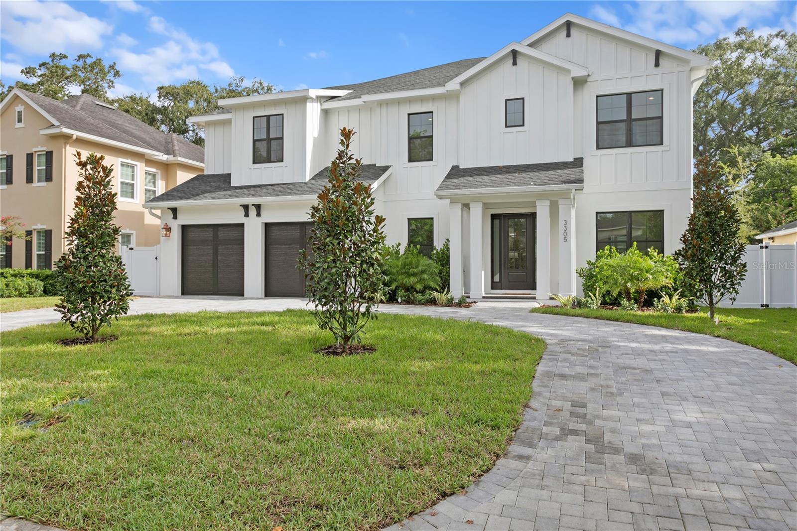 ELEVATED! Brand new/Just completed December 2024, TB Home's Modern Farmhouse w/Circular Driveway. The Home has been BUILT UP with Grand Stairs up to the Entry Porch. Salt-Water Heated Pool, Outdoor Kitchen & Beautifully Landscaped for ultimate Privacy. 2 Story Block, Impact Rated Windows/Doors & Sprayfoam Insulation! Stunning interior package; Wide Plank White Oak Flooring throughout, Coffered ceilings in Great Room w/stained wood detail insets, Level 4 Smooth Drywall Finish, Solid Core Interior doors, Surround & Sound Pre-wires, Restoration Hardware Lighting throughout, Designer Tiles, Stained wood exterior Ceilings, Shiplap in inset of Primary Bedroom tray ceiling + Many more Unique Appointments. 1st floor holds a large open concept Kitchen w/Custom Shaker Cabinets stacked to ceiling (Under-Cabinet Lighting), Cabinets are a mix of White & Natural Stained Wood, Pot filler, Sub-Zero/Wolf Appliance Package, Farm Sink, Quartz to mimic Marble w/light & bright Breakfast Nook. Formal Dining Room is accessed through Butler's Pantry (Stained Wood Cabinetry & Wine Fridge + Chef's Pantry) complimented w/a stunning Restoration Hardware Chandelier. Study w/glass French doors off of Foyer, Practical Mud-station, Powder Bathroom PLUS 1st floor Guest Suite w/Full Bathroom. Upper floor holds large Primary Suite w/Custom Built-out Closet. 2 good sized Bedrooms share a Jack N Jill style Bathroom, En-Suite Bedroom w/private bathroom. A large well laid out Laundry Room (lowers/uppers/sink/drying rod) and a 20x20 Media/Game-Room w/kitchenette (microwave + fridge + cabinets + sink) & it's own powder bathroom. Oversized 2 car garage (31' depth on one side & 23' depth on the other side). Gorgeous 5 bedrooms (including 1st floor guest suite), Study w/glass French doors, Dining Room & Media Room make this home functionally perfect! Mabry, Coleman & Plant school district! Great South Tampa location! Home is complete! Photos are from the same model with staging furniture. 2 additional completed homes available, not yet in the mls, please request addresses.