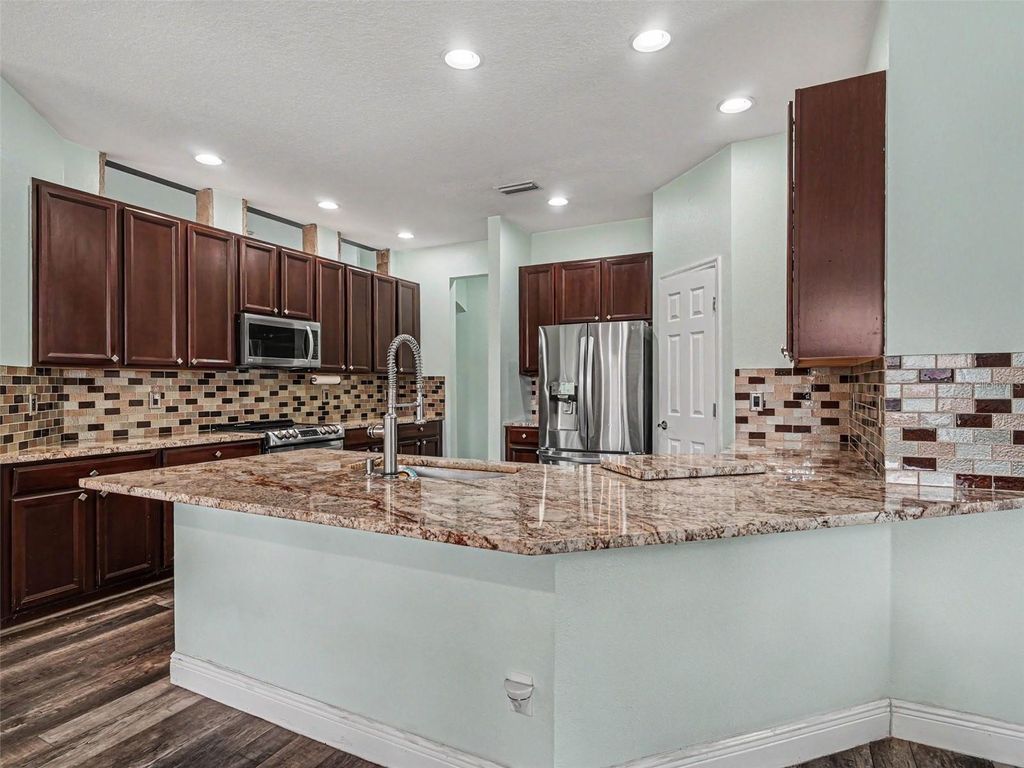 Photo of 1656 Pinyon Pine Dr, Sarasota, FL 34240 (MLS # TB8501410)