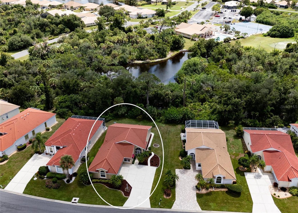 Photo of 8351 Creekview Ln, Englewood, FL 34224 (MLS # A4705646)