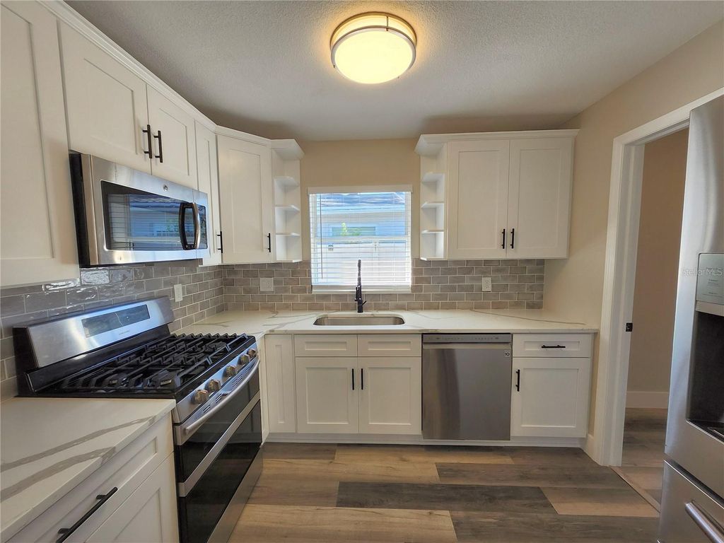 Photo of 1818 Shore Acres Boulevard NE, St Petersburg, FL 33703 (MLS # TB8454495)