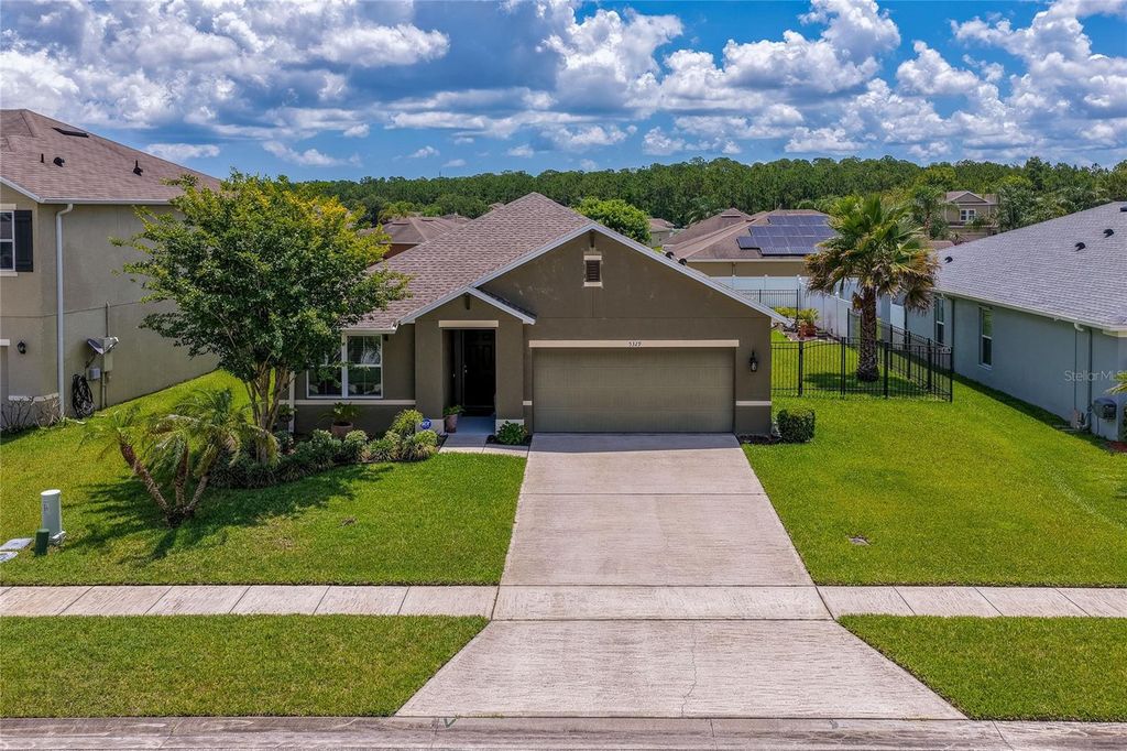 Photo of 5329 Royal Plantation Boulevard, Port Orange, FL 32128 (MLS # V4949701)