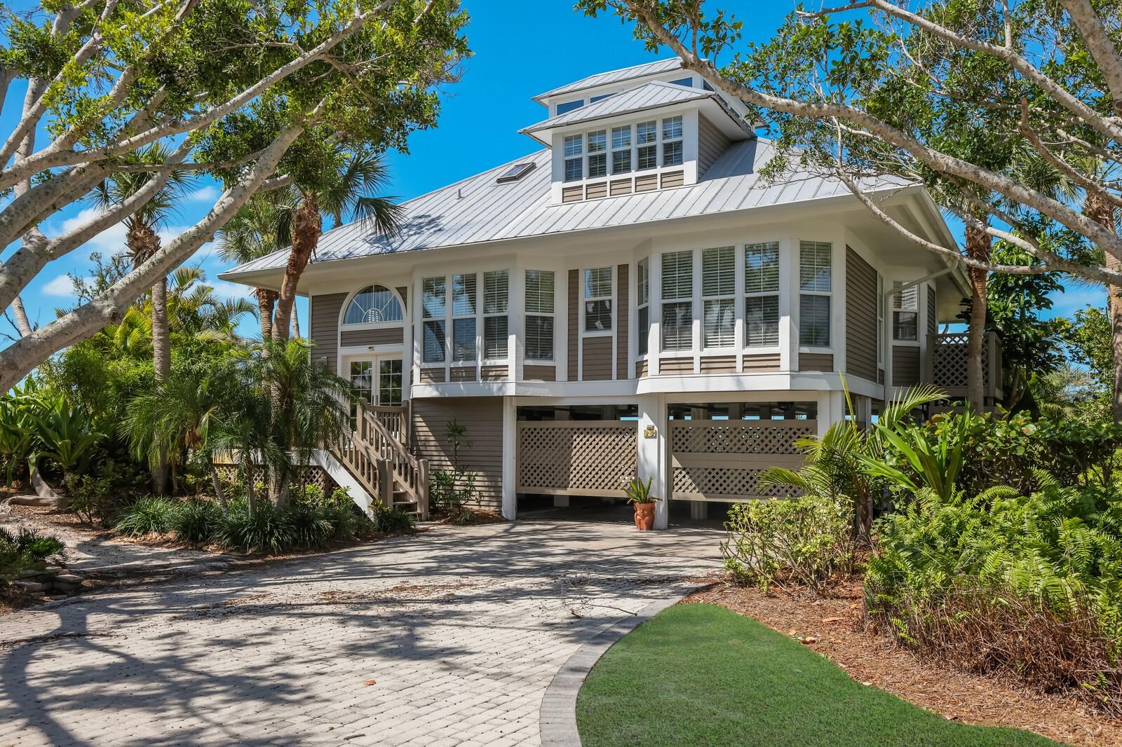 Enveloped by magnificent tree lined roads, this charming beachfront 3 bedroom, 3 bath, with 2 half bath residence located in the gated community of Seawatch is ideally positioned capturing 1,000 feet along the Gulf of Mexico.
The interior design is perfect for entertaining and delivering unparalleled gulf views and impressive evening sunsets from the main living area and the large wrap around screened lanai.
The open floor plan features cathedral ceilings, built-in cabinetry, light colored wood flooring, glass-filled front and rear elevation with views of mature tropical landscaping. The main level also includes a sitting area with water views and two guest bedrooms, one being an en-suite.
The graceful kitchen features Corian counters with bar top seating, built-in Thermador double ovens, cooktop stove, and a Sub-Zero refrigerator.
The upper-level owners retreat is appointed with a private waterfront balcony, walk-in closet, and a spa-inspired master bath featuring a walk-in shower, jacuzzi, and dual sinks.
Additional features include a 2-car garage and storage room.
Two pools, two tennis courts and four dune walk-overs are the gateway to the beach and are found in this most coveted neighborhood where your coastal retreat awaits.