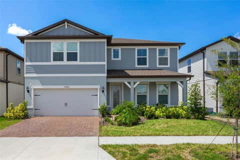 Photo of 17801 Wind Chime Row, Land O Lakes, FL 34638 (MLS # TB8538207)