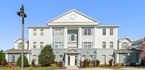 Photo of 7631 Heritage Crossing Way #302, Reunion, FL 34747 (MLS # O6351250)