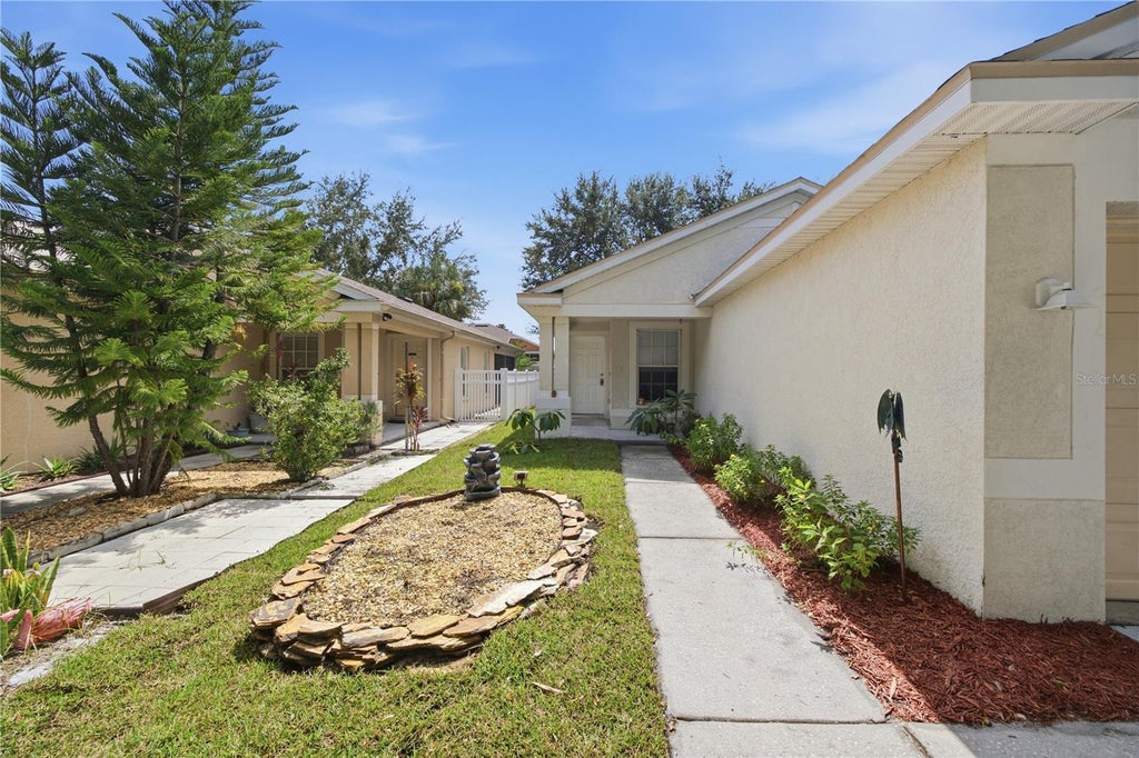 Photo of 11426 Bay Gardens Loop, Riverview, FL 33569 (MLS # TB8546378)
