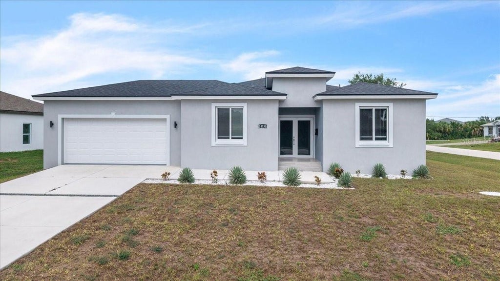 Photo of 14150 Appleton Boulevard, Port Charlotte, FL 33981 (MLS # C7531838)